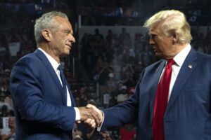 rfk jr and donald trump shaking hands