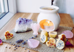 Wax melts next to aromatherapy lamp.