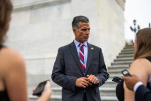 Rep. Dan Meuser speaks to reporters