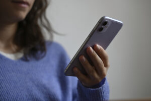 Woman Holding Her Phone