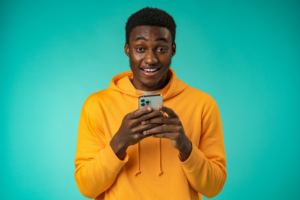 Man Yellow Sweatshirt Mint Green Background Phone