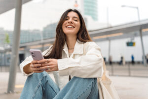 Young woman at bus stop