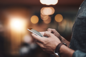 Man Wearing Watch Mobile Phone Blurred Background