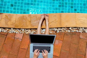 Fle photo of woman using laptop.