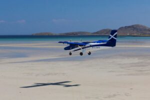 Aircraft at beach runway of Barra Airport.