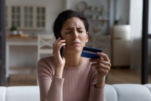 Woman giving credit card info