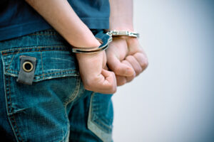 teen in handcuffs
