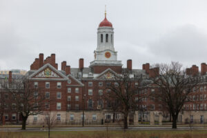 A person runs past Dunster House