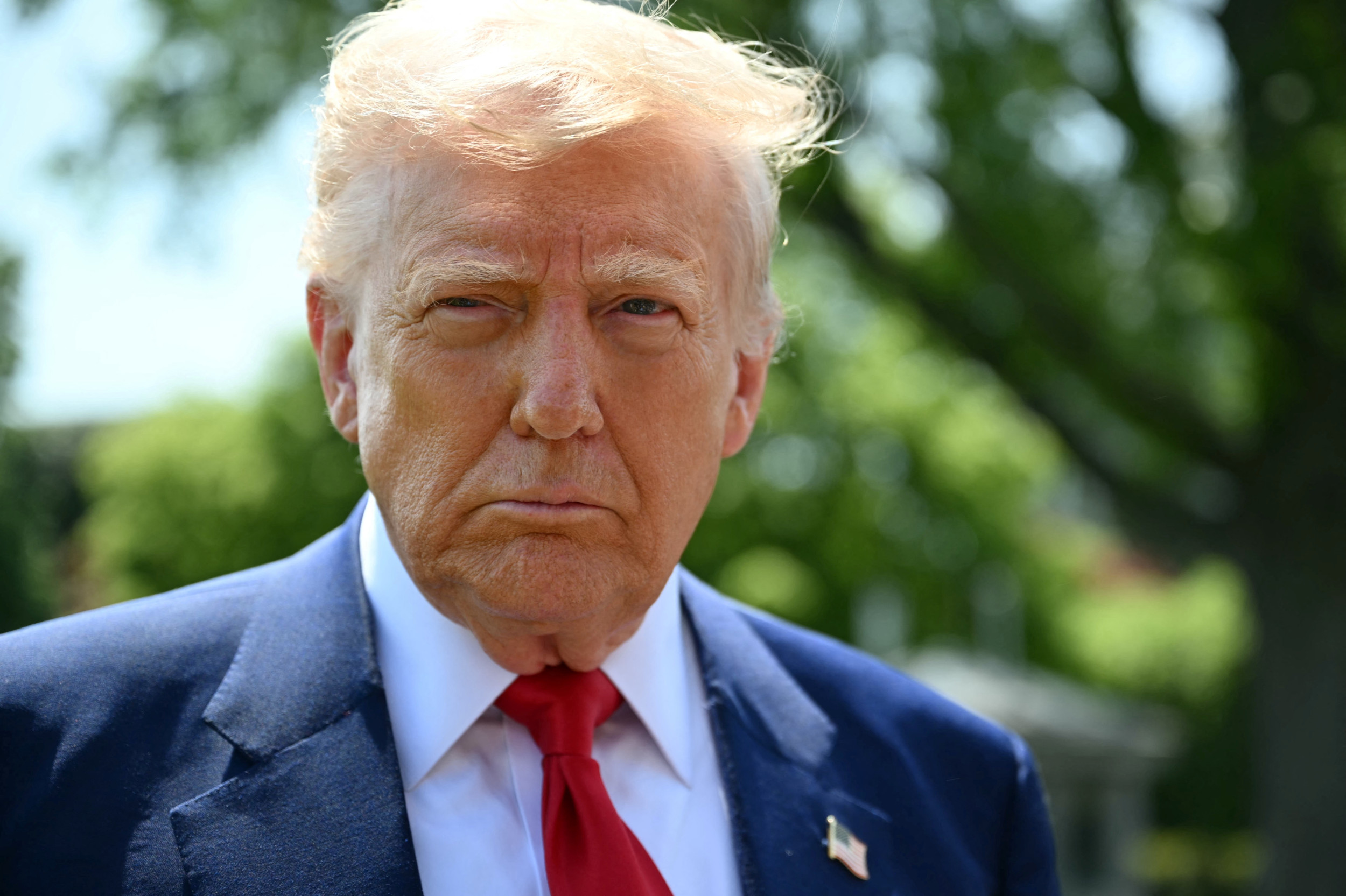 President Donald Trump speaks to the press
