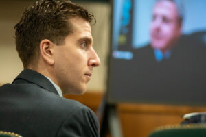 Bryan Koberger listens during a hearing
