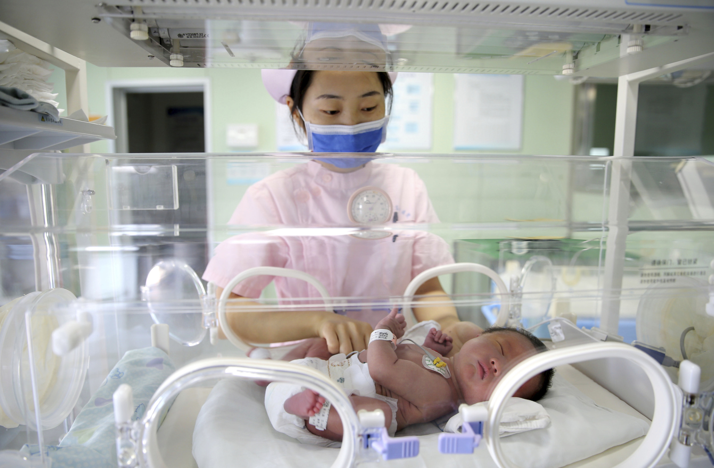 Nurse Attends to Newborn in Jiangsu Province
