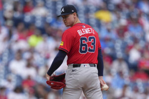 Scott Blewett pitching for the Braves