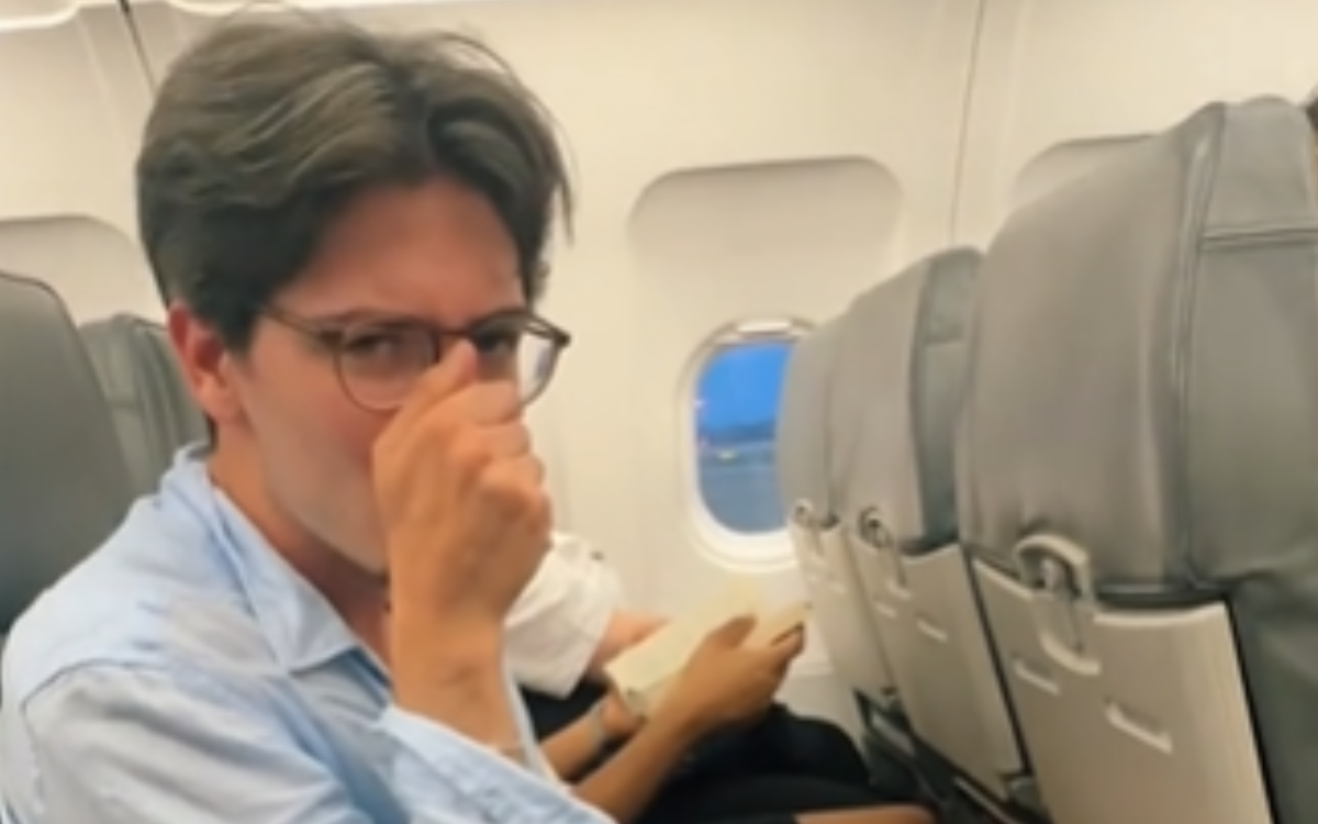 Francesco Treu reacting to the smell.
