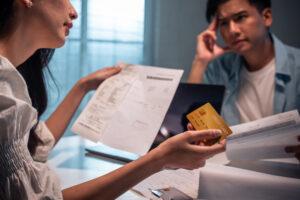 Millennial Couple Look Stressed Discuss Finances