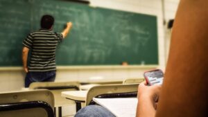 Schools fight AI cheating with return to pen and paper blue books