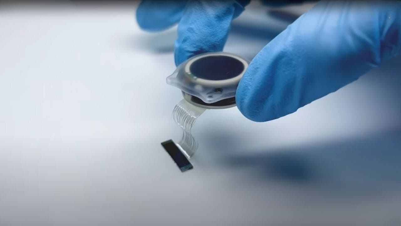 First woman with Neuralink brain chip writes her name after 20 years
