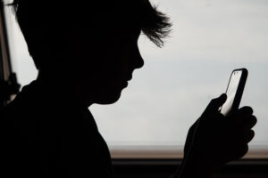 Boy on phone
