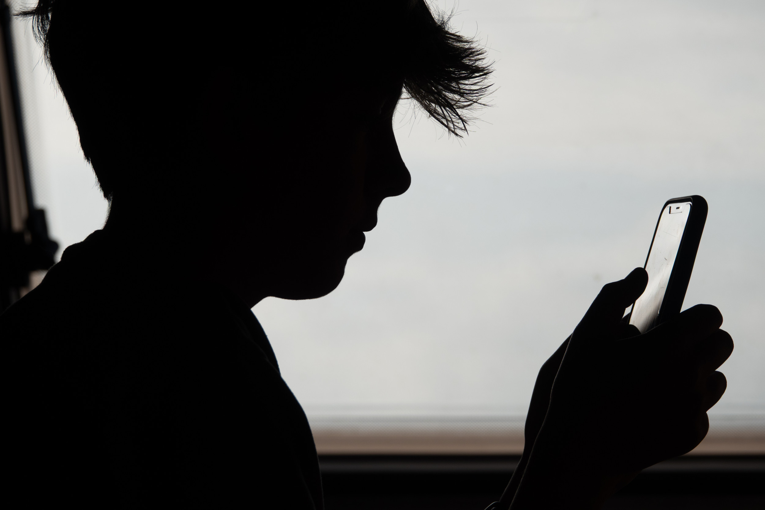 Boy on phone