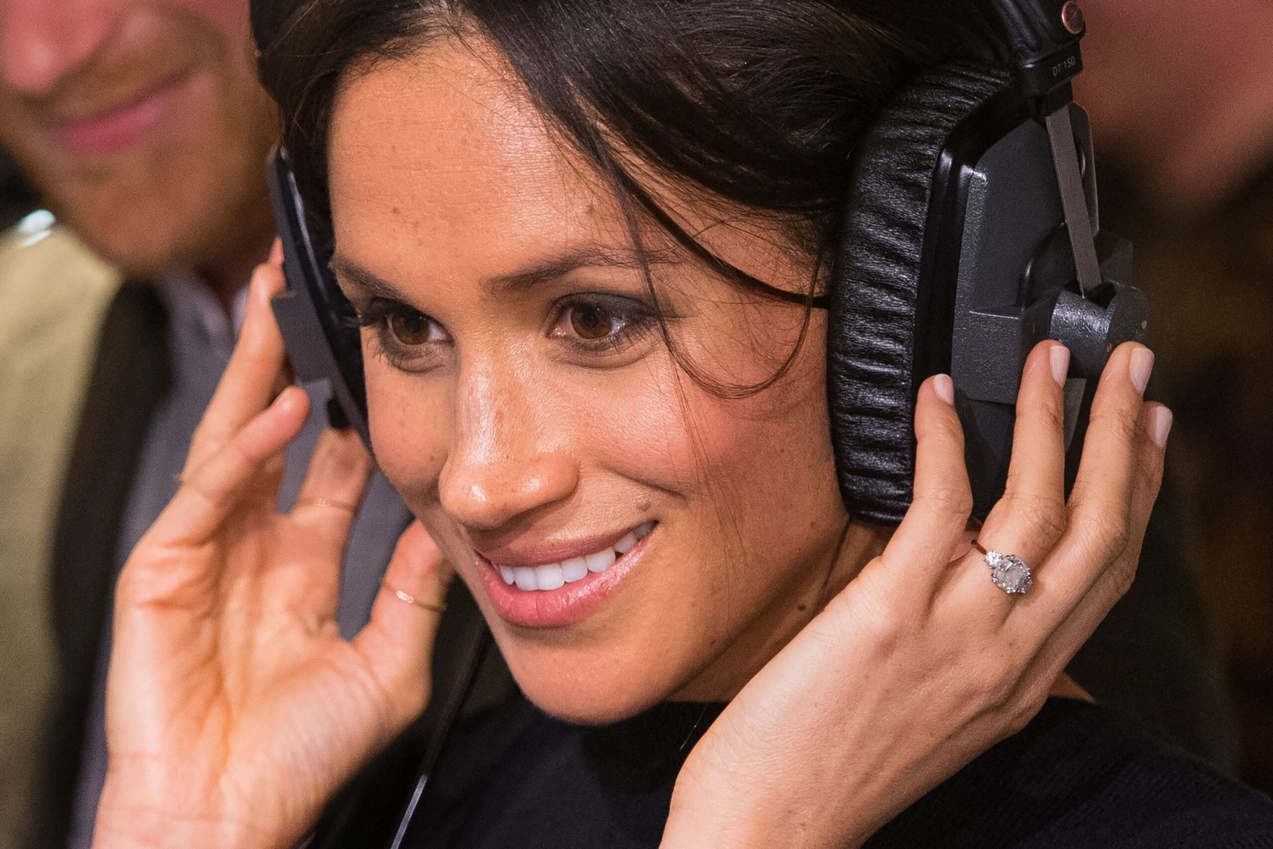 Meghan Markle Listens to the Radio