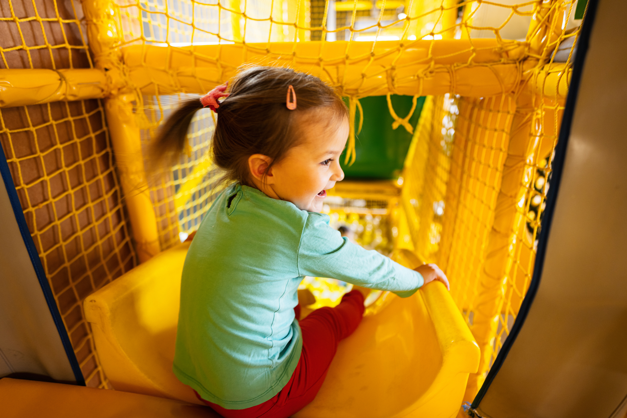A young girl on slide