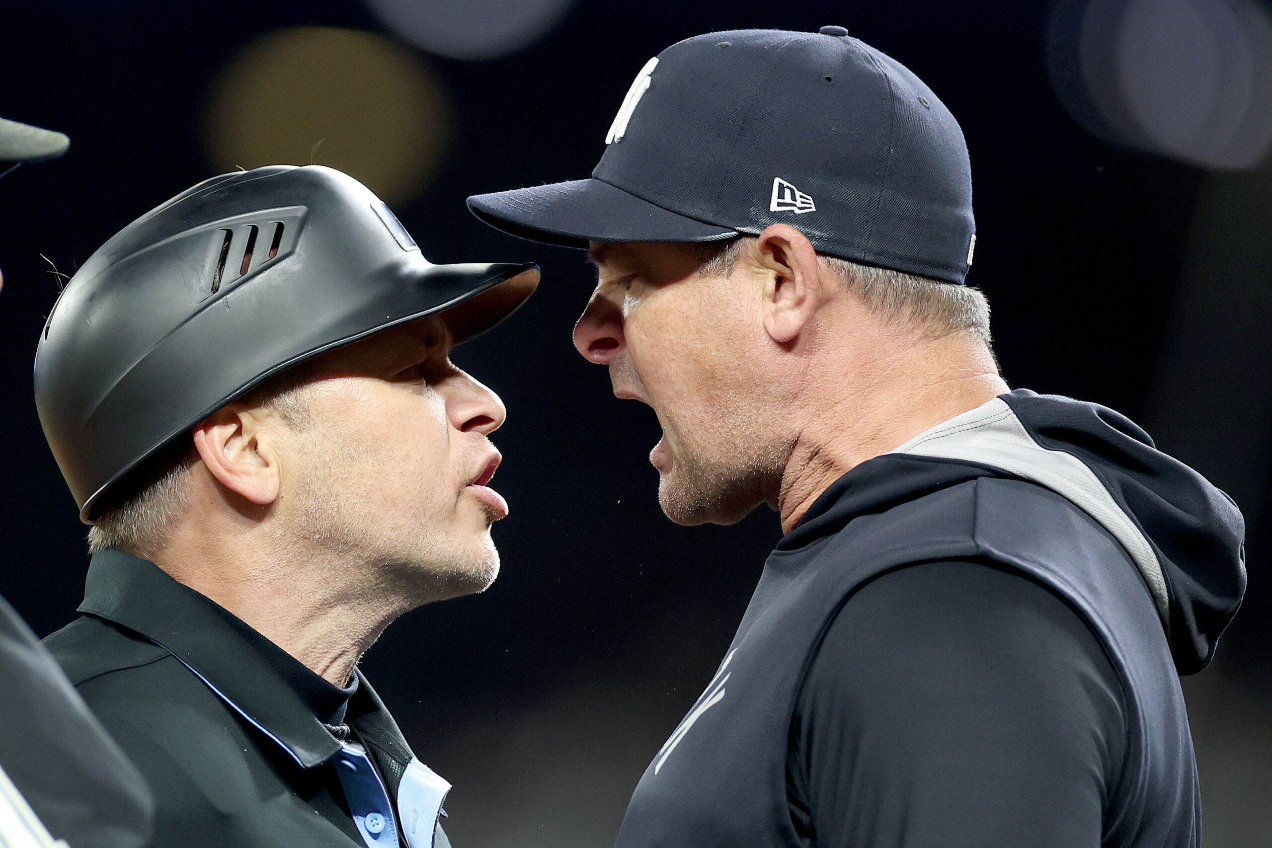 Yankees Manager Aaron Boone argues with ump.