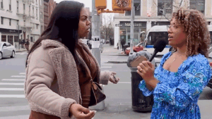 gif of a pro-abortion street interviewee (left) punching a conservative influencer (right) during pro-life debate